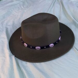 Dark Green, soft, wrapped with a black and silver buckle/belt.